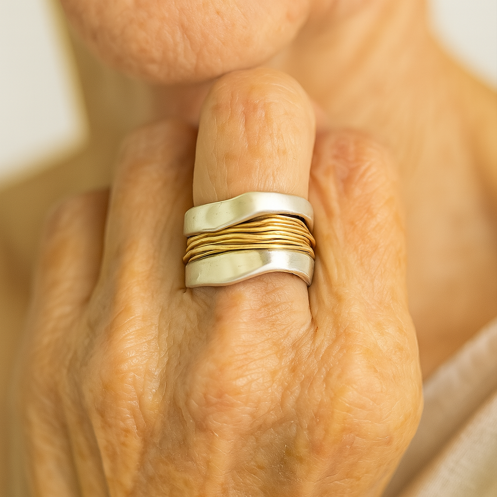 Silver Ring Adorned with Golden Threads