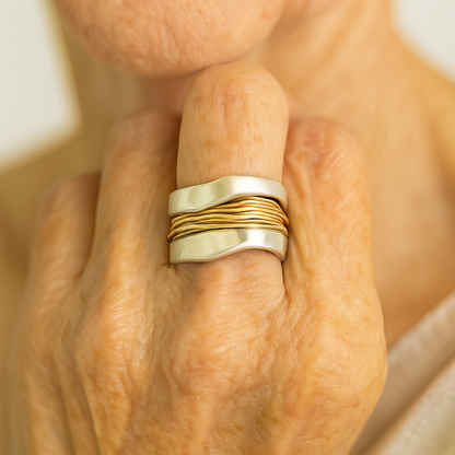 Silver Ring Adorned with Golden Threads